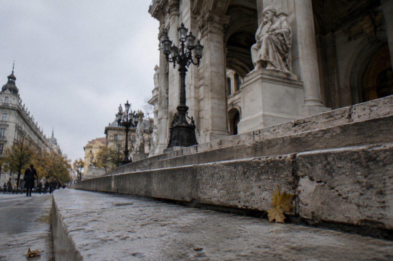 Classical museum facade with columns and stone steps in Budapest