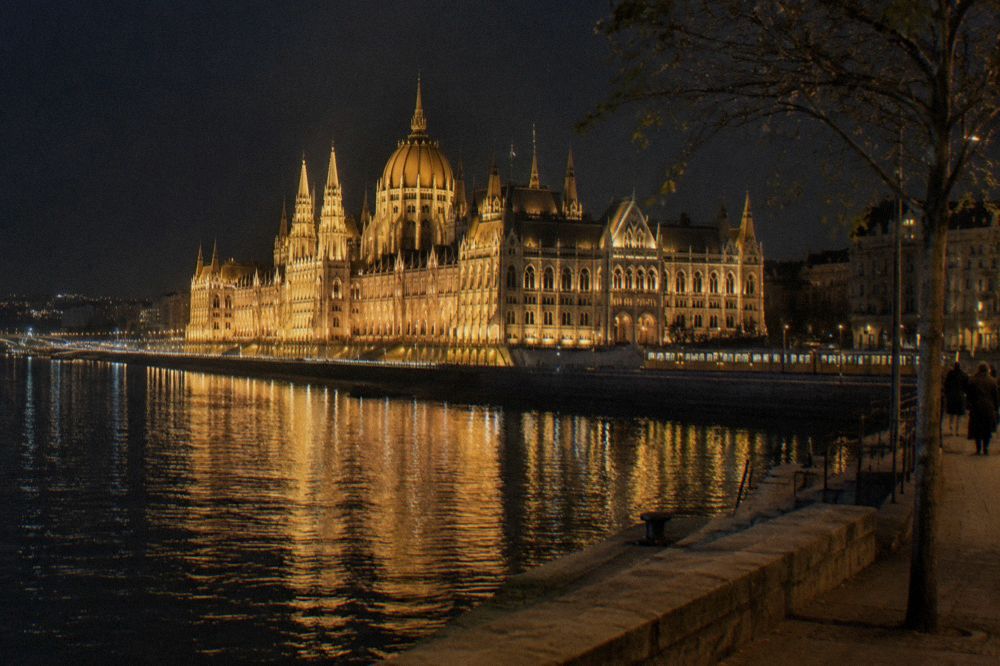 Parliament and the Danube embankment lit at night
