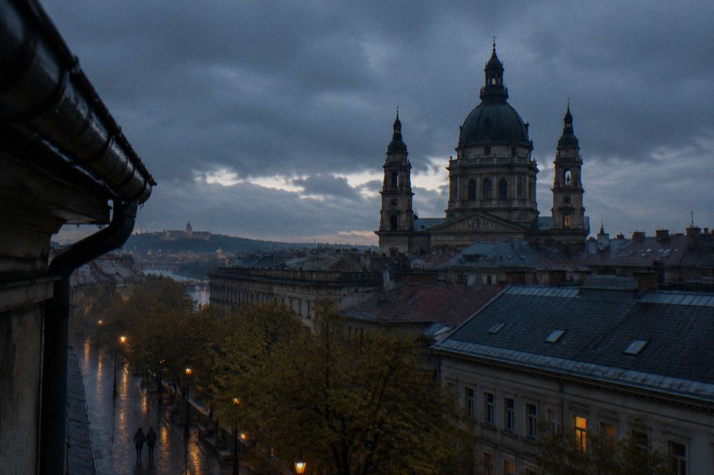 Budapest rooftops and the Basilica dome under an evening sky