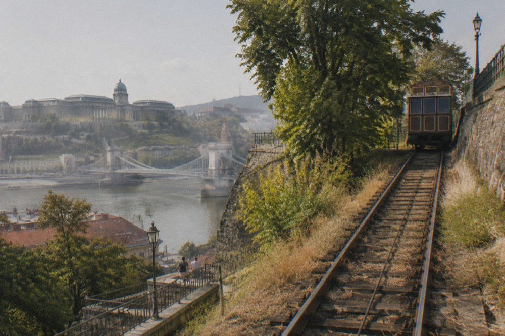 The stone staircase and funicular track climbing the side of Castle Hill in Budapest