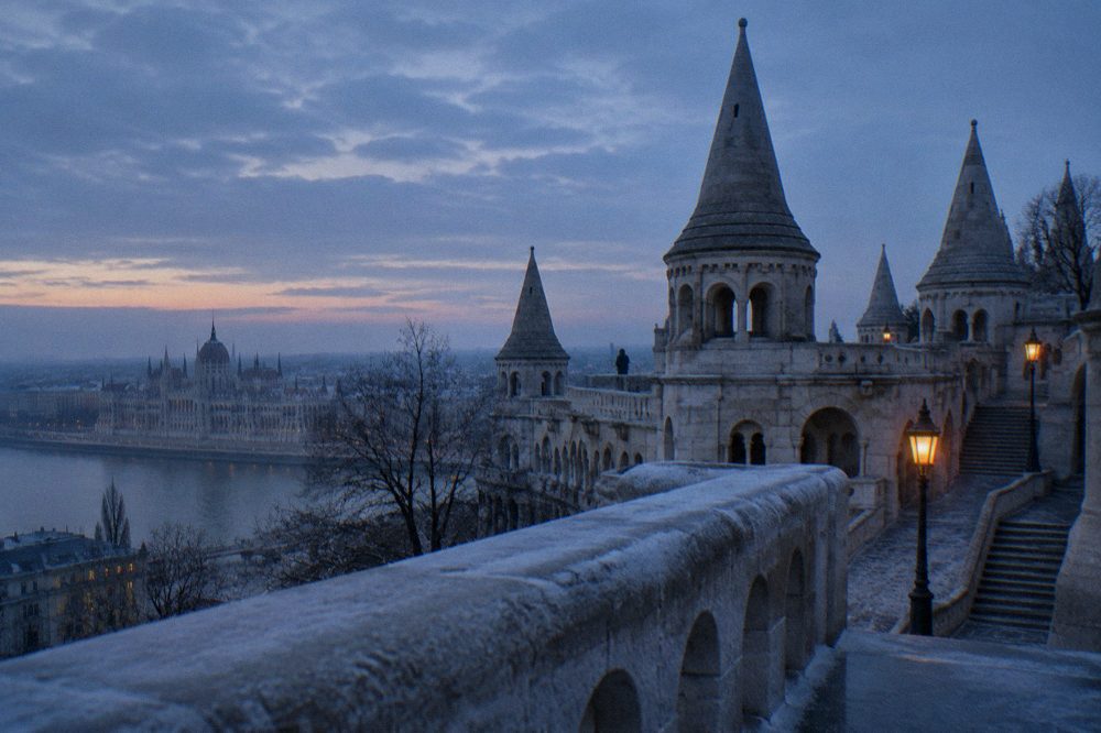 The white terraces and pointed towers of Fisherman's Bastion against the sky