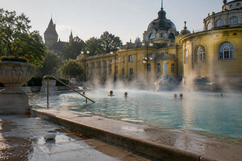 Steam rising from an outdoor thermal pool in Budapest
