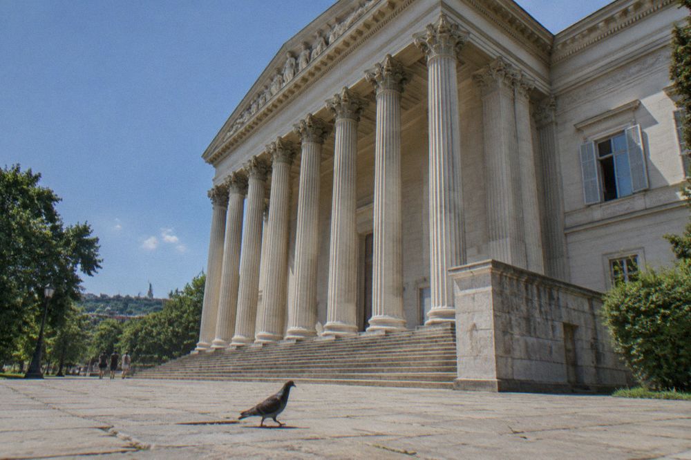 Classical museum facade in Budapest with summer light on its columns