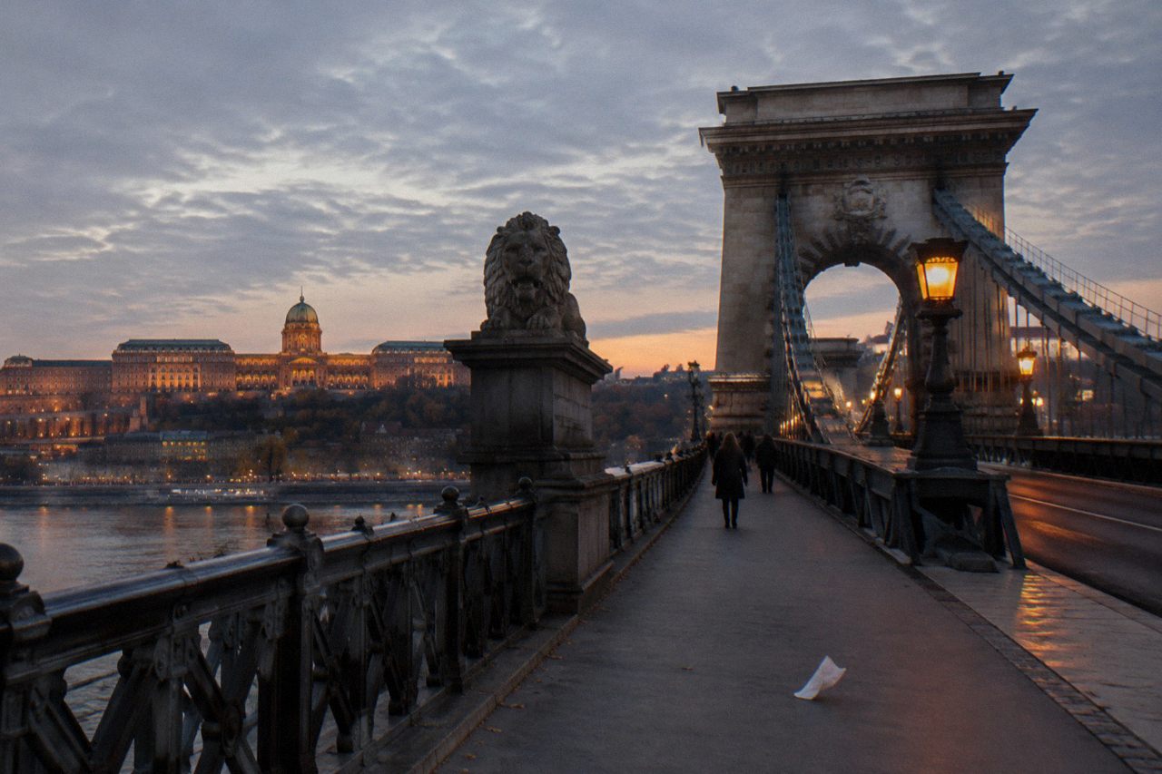 Chain Bridge and the illuminated Buda Castle hill above the Danube at dusk
