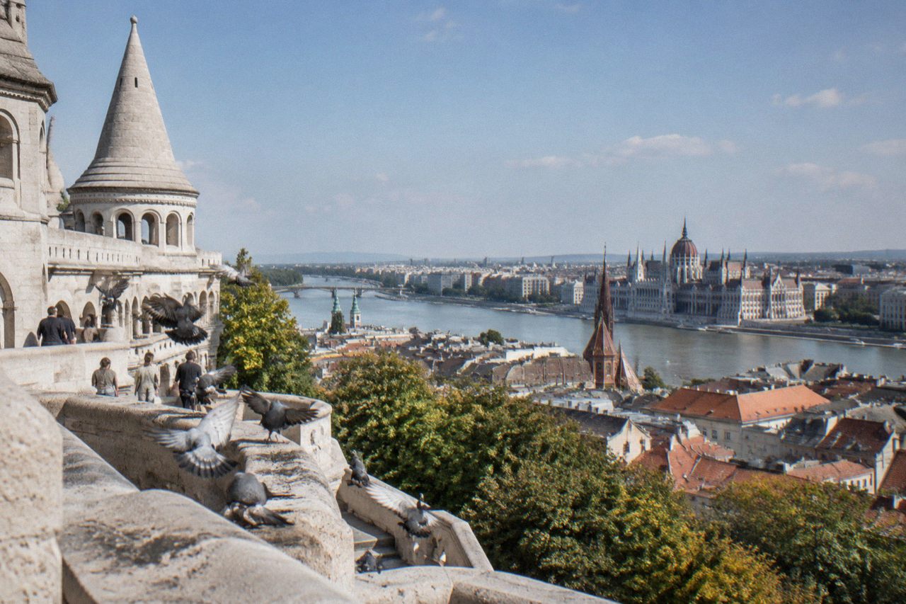 Fisherman's Bastion terraces and turrets above Budapest rooftops on a clear day