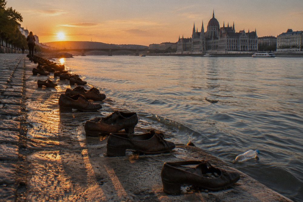 iron shoes placed along the stone edge of the Danube embankment in Budapest
