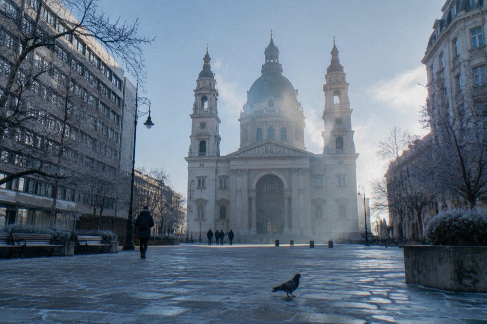 The facade and towers of St Stephen's Basilica from the square below